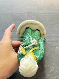 A Chinese verte biscuit Luohan holding a ruyi, Kangxi