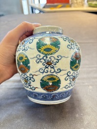 A pair of Chinese doucai 'chrysanthemum' jars and covers, Daoguang mark and of the period