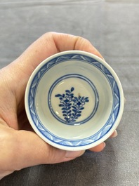 Ten Chinese blue and white cups and nine saucers, Kangxi mark, 19th C.