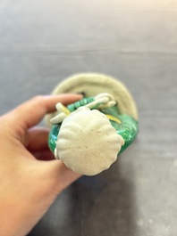 A Chinese verte biscuit Luohan holding a ruyi, Kangxi