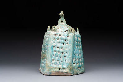 A Nishapur turquoise-glazed bowl, an inkwell and an incense burner or lantern, Iran, 10/12th C.