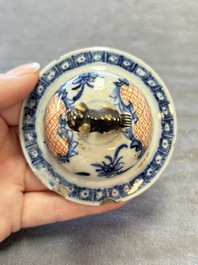 Three Chinese famille rose 'mandarin subject' vases and covers, Qianlong