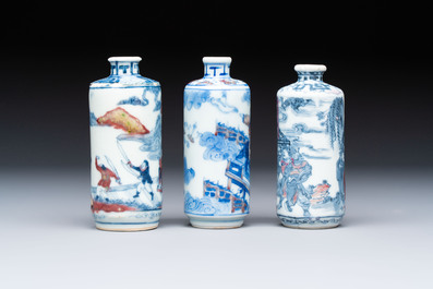 Three Chinese blue, white and copper-red snuff bottles, 19th C.