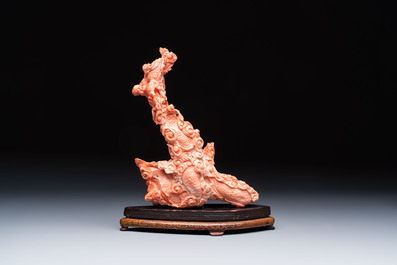 A Chinese carved red coral 'dragon' group, 19/20th C.