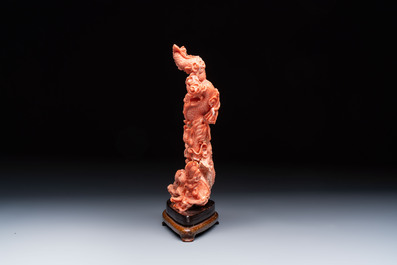 A Chinese carved red coral 'dragon' group, 19/20th C.