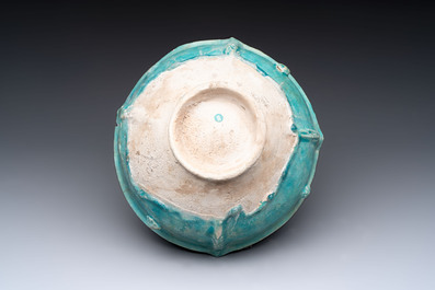A Nishapur turquoise-glazed bowl, an inkwell and an incense burner or lantern, Iran, 10/12th C.