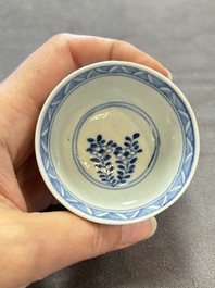 Ten Chinese blue and white cups and nine saucers, Kangxi mark, 19th C.