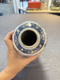 Three Chinese famille rose 'mandarin subject' vases and covers, Qianlong