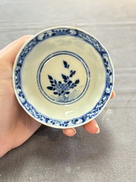 Ten Chinese blue and white cups and nine saucers, Kangxi mark, 19th C.