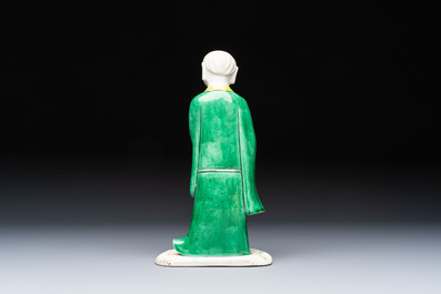 A Chinese verte biscuit Luohan holding a ruyi, Kangxi
