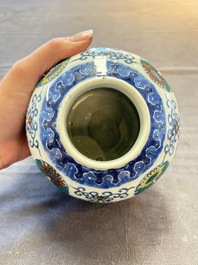 A pair of Chinese doucai 'chrysanthemum' jars and covers, Daoguang mark and of the period