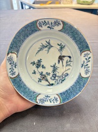 Four Chinese doucai plates with birds among bamboo and floral design, 18th C.