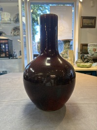 A Chinese flamb&eacute;-glazed bottle vase, 19th C.