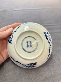 Ten Chinese blue and white cups and nine saucers, Kangxi mark, 19th C.