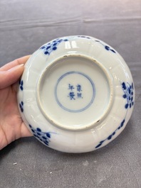 Ten Chinese blue and white cups and nine saucers, Kangxi mark, 19th C.