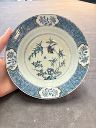 Four Chinese doucai plates with birds among bamboo and floral design, 18th C.