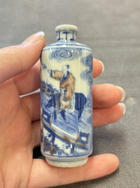 Three Chinese blue, white and copper-red snuff bottles, 19th C.
