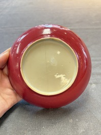 A Chinese famille rose ruby-back saucer dish with peaches and flowers, 18th C.