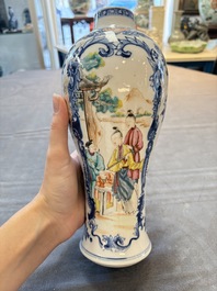 Three Chinese famille rose 'mandarin subject' vases and covers, Qianlong