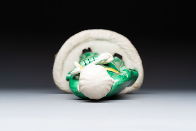 A Chinese verte biscuit Luohan holding a ruyi, Kangxi