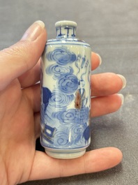 Three Chinese blue, white and copper-red snuff bottles, 19th C.