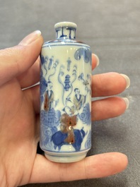 Three Chinese blue, white and copper-red snuff bottles, 19th C.