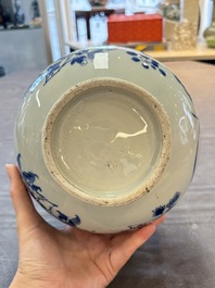 A Chinese blue and white bottle vase with floral design, Transitional period