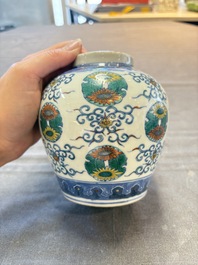 A pair of Chinese doucai 'chrysanthemum' jars and covers, Daoguang mark and of the period