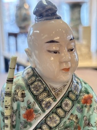 A Chinese famille verte figure of Han Xiangzi 韓湘子, Jiangxi mark, 19th C.