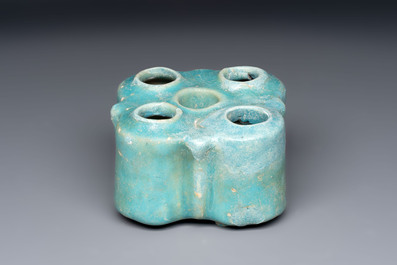 A Nishapur turquoise-glazed bowl, an inkwell and an incense burner or lantern, Iran, 10/12th C.