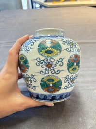 A pair of Chinese doucai 'chrysanthemum' jars and covers, Daoguang mark and of the period