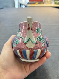 A Chinese famille rose frogspawn-ground relief-molded teapot and cover, Yongzheng