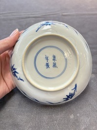 Eight Chinese blue and white cups and saucers, Kangxi mark, 19th C.