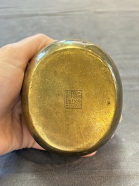 A Chinese mandarin duck-form water dropper, a hand warmer and a bronze censer, Zhen Wan 珍玩 and Zhang Mingqi Zhi 張鳴歧製 mark, 19th C.