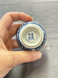 Ten Chinese blue and white cups and nine saucers, Kangxi mark, 19th C.
