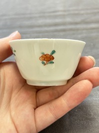 Seven Chinese famille rose cups and eleven saucers with floral design, Qianlong