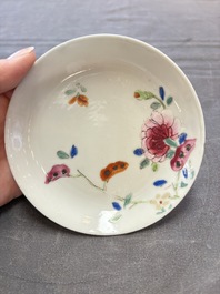Seven Chinese famille rose cups and eleven saucers with floral design, Qianlong