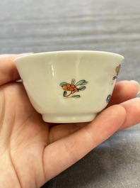 Seven Chinese famille rose cups and eleven saucers with floral design, Qianlong