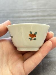 Seven Chinese famille rose cups and eleven saucers with floral design, Qianlong