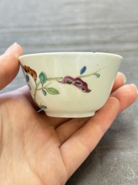 Seven Chinese famille rose cups and eleven saucers with floral design, Qianlong
