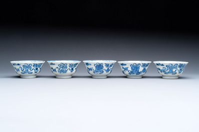 Five Chinese blue and white cups and saucers, Kangxi mark, 19th C.