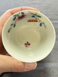 Seven Chinese famille rose cups and eleven saucers with floral design, Qianlong