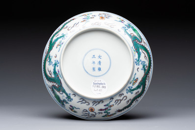 A Chinese doucai 'dragon' plate, Yongzheng mark and of the period