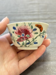 Seven Chinese famille rose cups and eleven saucers with floral design, Qianlong