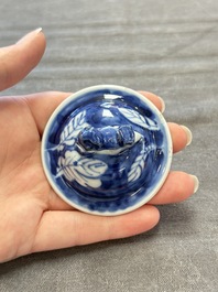 Three Chinese blue and white 'plum blossom' vases and covers, Kangxi mark, 19th C.
