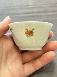 Seven Chinese famille rose cups and eleven saucers with floral design, Qianlong