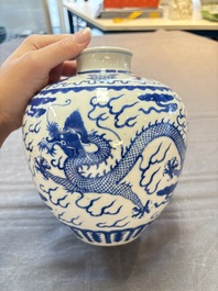 A Chinese blue and white 'dragon' vase, Kangxi mark, 19th C.