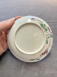 Seven Chinese famille rose cups and eleven saucers with floral design, Qianlong