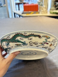 A Chinese doucai 'dragon' plate, Yongzheng mark and of the period