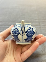 Three Chinese blue and white teapots, a cup and a saucer, Kangxi
